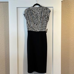Brand new, with stags, Express midi length dress w/animal print bodice